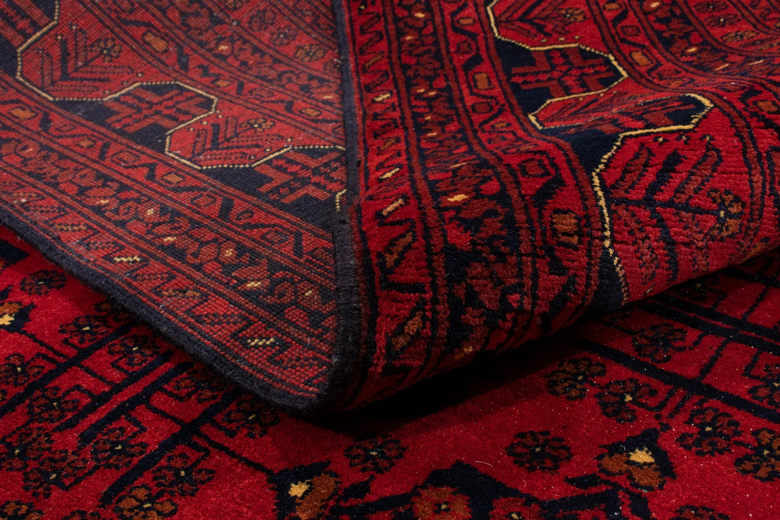The Earthy Elegance of the Firebrick Khal Mohammadi: A Rug Woven with Afghan Soul