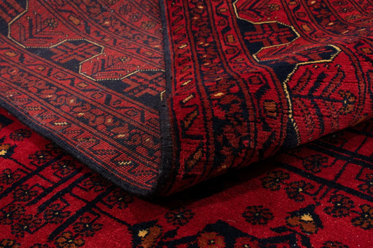 The Earthy Elegance of the Firebrick Khal Mohammadi: A Rug Woven with Afghan Soul